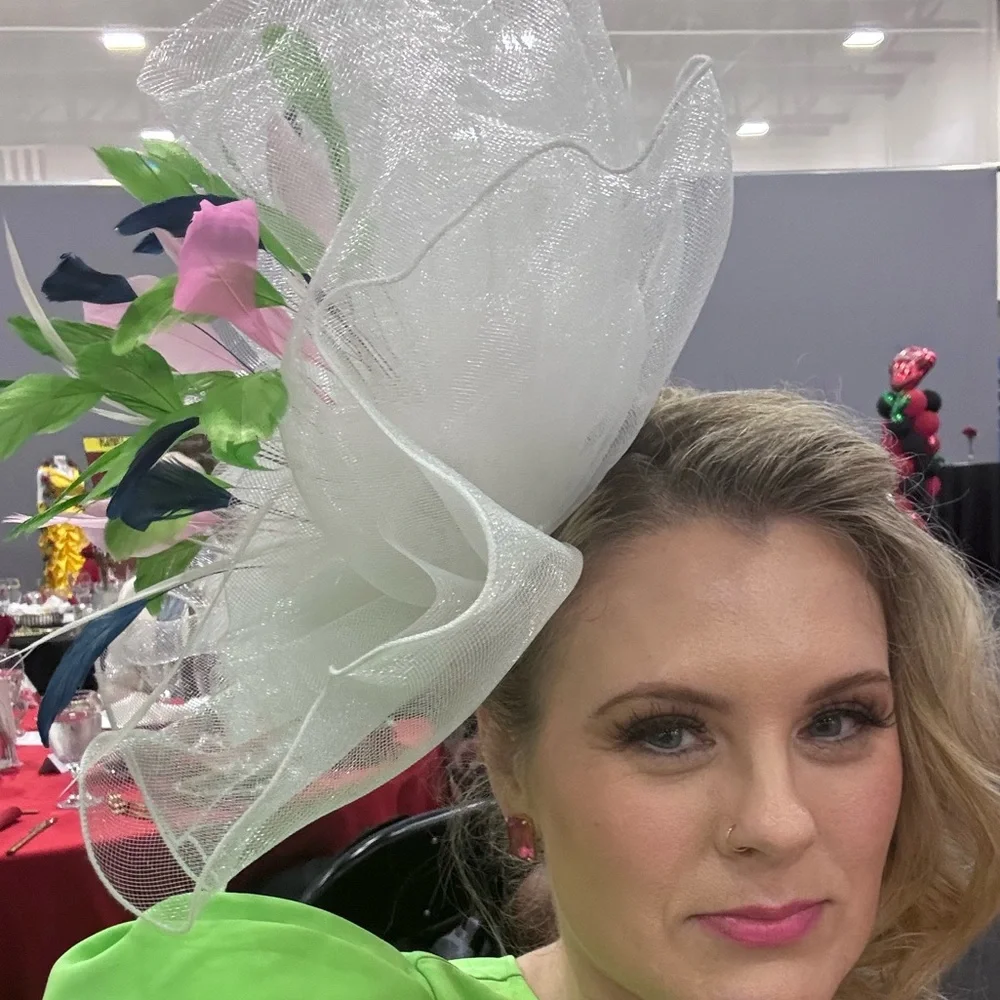 Elegant White Fascinator with Pink and Blue Accents